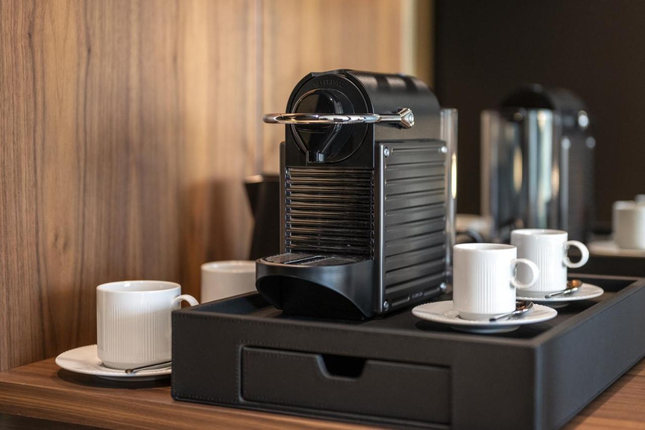 Renaissance Porto Lapa Hotel Bagian luar foto A Nespresso coffee machine