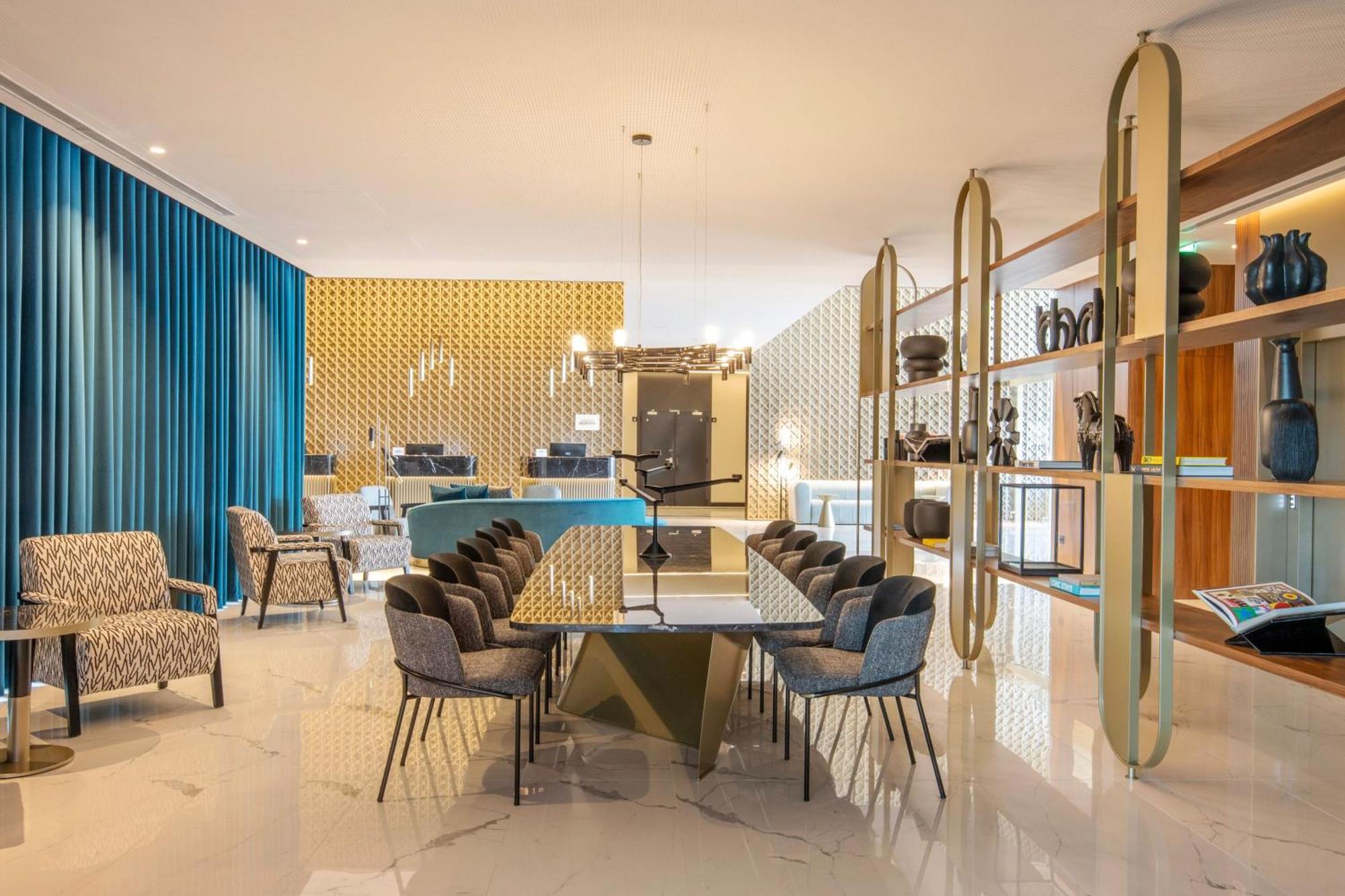 Renaissance Porto Lapa Hotel Bagian luar foto The interior of a typical apartment
