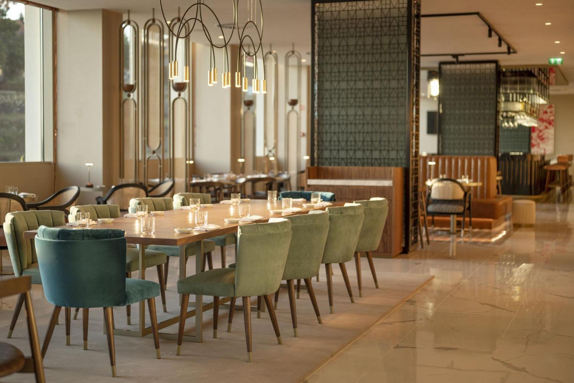 Renaissance Porto Lapa Hotel Bagian luar foto The restaurant